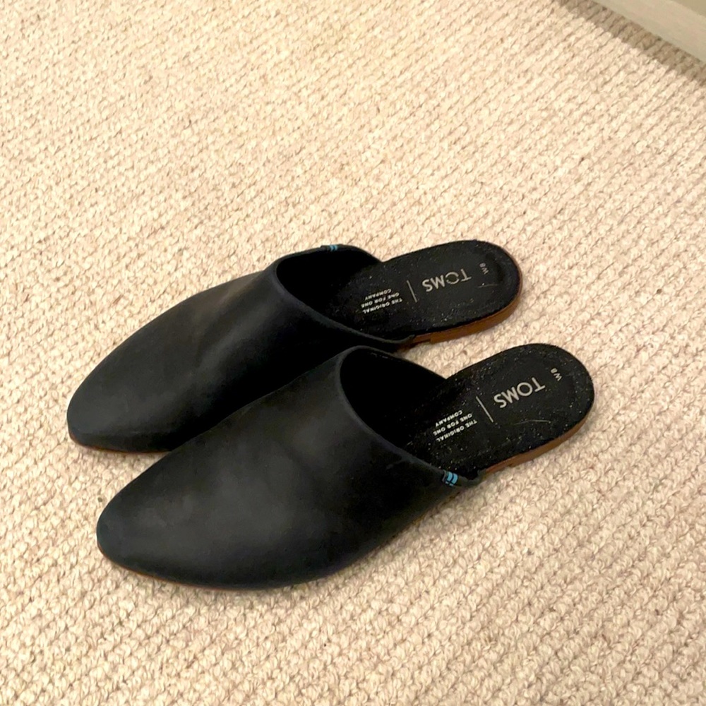 Black leather mules by Toms - size 8